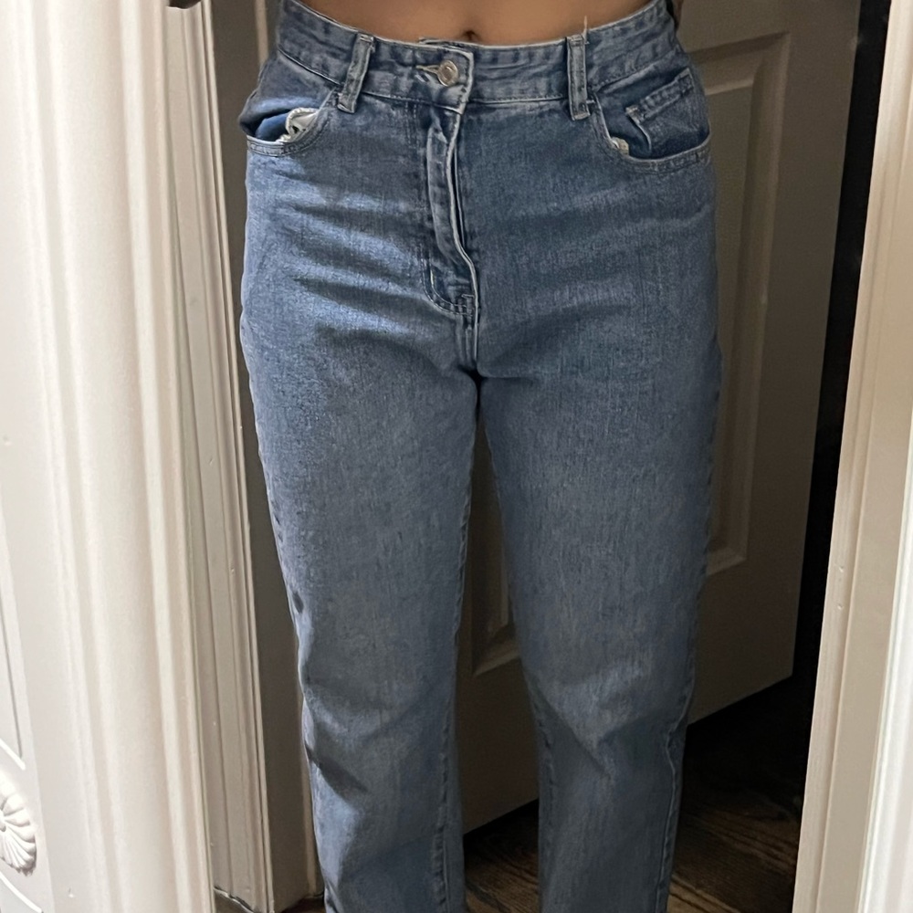 Dark washed denim high waisted straight legged jeans